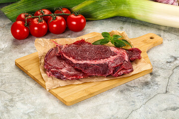 Raw beef cheeks cut for cooking