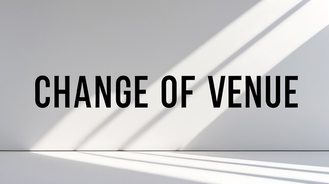 Change of venue displayed in bold typography on a plain background with shadows