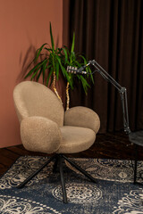 Podcast setup with microphone and chair for engaging interviews in a cozy environment