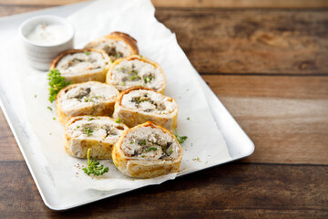 Homemade omelette roulade with chicken