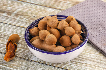 Tropical exotic Tamarind fruit heap