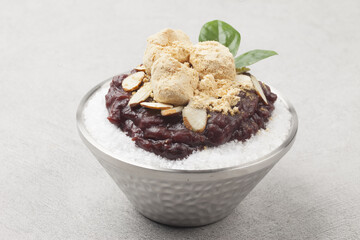    Patbingsu is a food made by mixing finely chopped ice cubes with boiled red beans, sugar,...