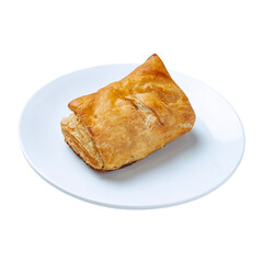 Delicious golden baked pastry on a white plate