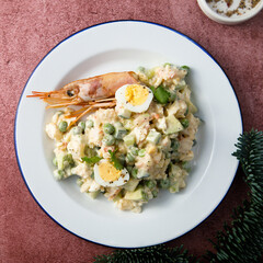 Russian salad with shrimps and avocado