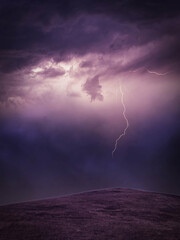Lightning in the dark sky. Purple unreal scenic apocalyptic background lightning strike the ground.	