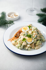 Russian salad with shrimps and avocado