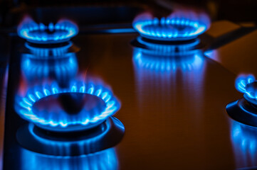 Gas stove on, gas supply and energy dependence.
