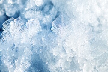 Fototapeta premium Close-up view of delicate snowflakes shimmering in winter sunlight in a serene snowy landscape