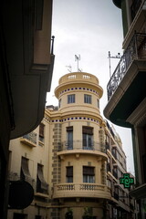 Historic Art Deco Corner Building with Tower in Spanish Urban Setting