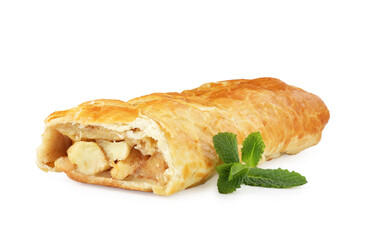 Delicious strudel with apples, powdered sugar and mint isolated on white