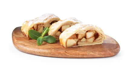 Pieces of tasty apple strudel with powdered sugar and mint isolated on white