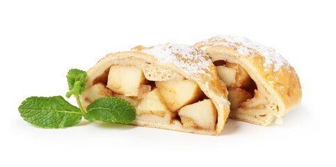 Pieces of tasty apple strudel with powdered sugar and mint isolated on white