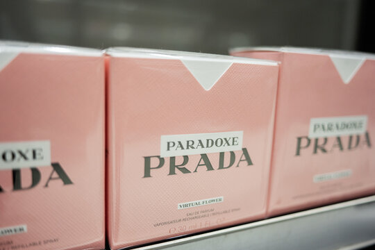 Stylish pink packaging for a luxury Prada Paradoxe perfume.