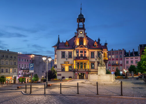 Nowa Ruda, Poland. Historic building of Town Hall and Market Square (Rynek) at dusk
