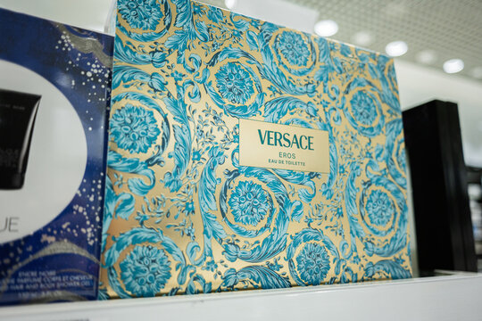 Versace Eros Eau de Toilette packaging with vibrant blue and gold patterns
