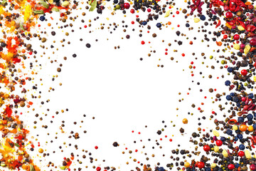 Colorful assortment of spices surrounding a dark center