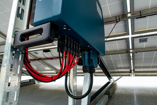 Solar panel inverter under canopy.  Solar power plant 
Back view. Inverter Installation. 