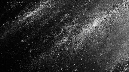 White Powder Scattered On A Black Surface