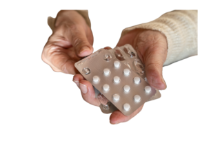 Old woman 70s taking white pill. Grandmother putting tablet. Close up PNG