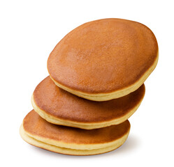 Stack of pancakes close-up on a white. Isolated