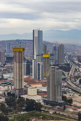 Obraz premium Izmir, Turkey - February 02, 2025: Aerial panoramic view in Bayrakli. Bayrakli is a modern business district of Izmir city in Turkey.