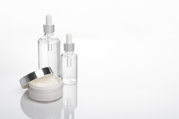 transparent dropper bottle with white background