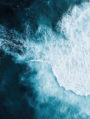 Fototapeta premium A surfer riding a wave in the ocean, with sea spray and sunshine