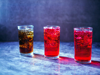 A lot of Soft drinks in colorful and flavorful glasses on the table,Glasses with sweet drinks with...
