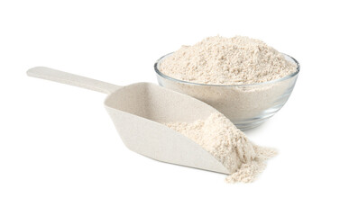 Brown rice flour in bowl and scoop isolated on white