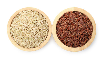 Different sorts of raw brown rice isolated on white, top view