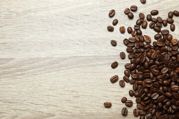 Coffee beans on wooden background