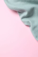 Warm scarf on a pink background