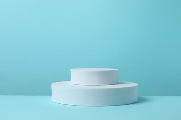 White podiums on a blue background
