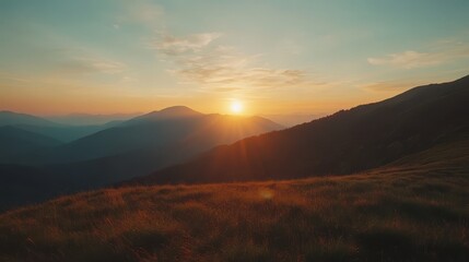Obraz premium Serene Sunset Over Majestic Mountains with Colorful Sky and Clouds