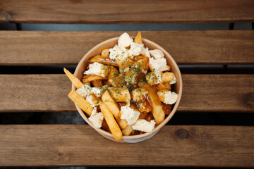 Poutine fries with chees and sauce