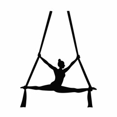 Silhouette of a woman performing aerial and fitness exercises