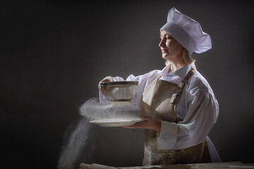 An elderly woman joyfully preparing dough from flour during a fun kitchen photo shoot