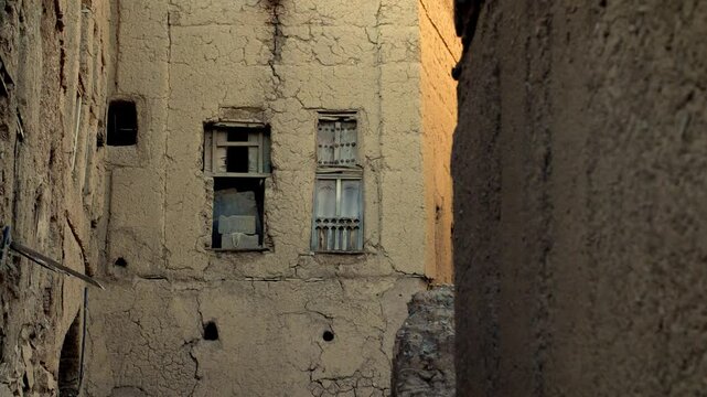old ruins wall in the rich cultural heritage of Oman at Bait Al Safah, a living museum in Al Hamra showcasing traditional Omani life