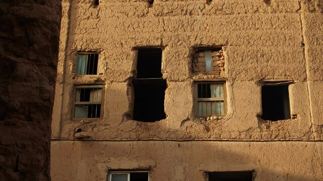 house sun low angle view of old ruins in the rich cultural heritage of Oman at Bait Al Safah, a living museum in Al Hamra showcasing traditional Omani life