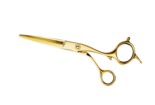 Modern and luxurious hair-cutting gold scissor isolated on cut out PNG or transparent background. Professional hairstyling tools. Advertising or product presentation.