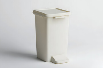 Modern sleek small white plastic trash bin for office minimalist design on white background with light and shadow. Garbage container with lid. Concept of cleaning waste separation and public hygiene.