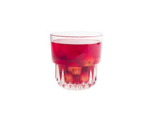 Sweet refreshing berry compote from ripe cherries in a glass isolated on white background.