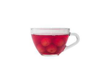 Sweet refreshing berry compote from ripe cherries in a glass isolated on white background.