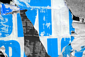 Old ripped torn grunge posters and backgrounds creased crumpled paper backdrop surface placard empty space for text