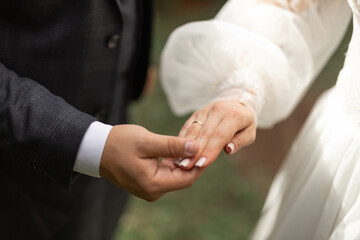 hands of newlyweds as a symbol of love at a wedding	
