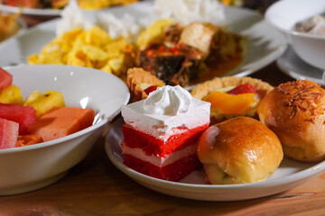 Traditional Indonesian Ramadan cake, captured on March 17, 2025. This sweet and fluffy treat is perfect for iftar, featuring rich flavors and a soft texture