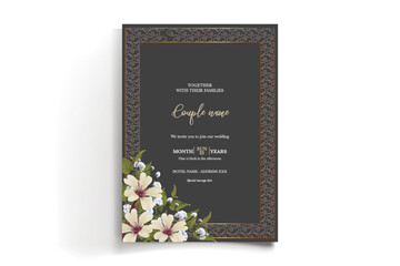 WEDDING INVITATION FRAME WITH FLOWER DECORATIONS AND FRESH LEAVES