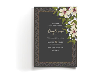 WEDDING INVITATION FRAME WITH FLOWER DECORATIONS AND FRESH LEAVES