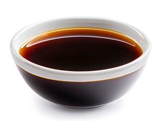 A small white bowl filled with dark brown soy sauce sits on a white background, ready for use in cooking or as a condiment.