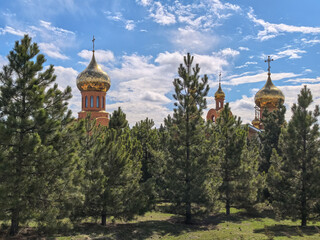christian church in a green forest without people